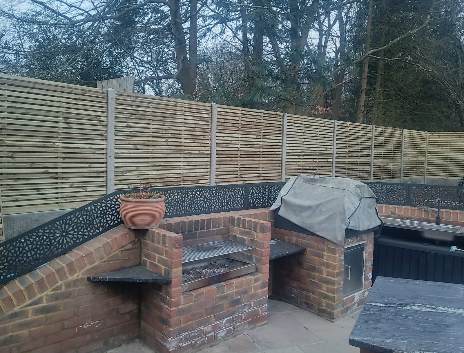 Amazing garden with slatted fence