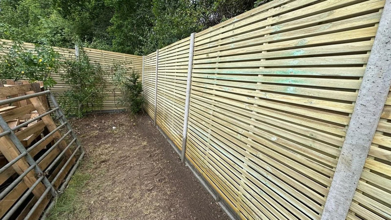 Slatted fence first 